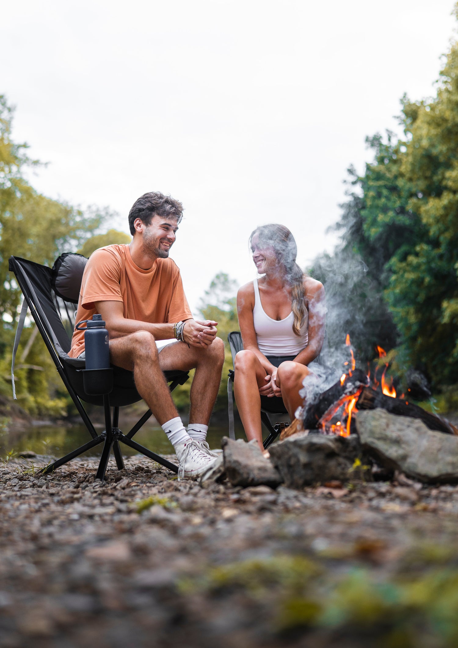 Cliq chairs around a campfire